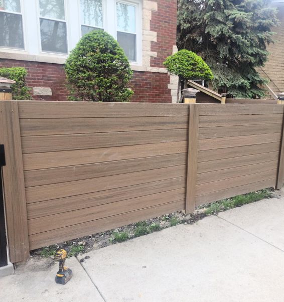 wooden fence of lawn infront of house flossmoor il